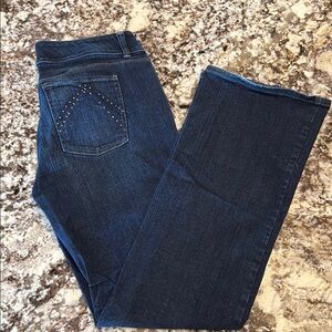 Women's boot cut jeans with embellished pockets - excellent condition